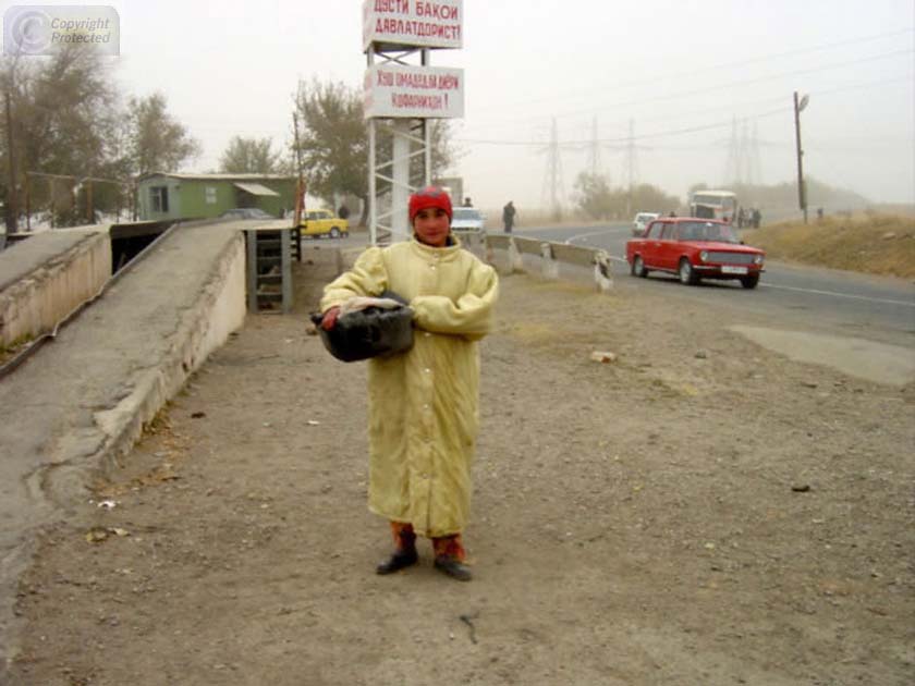 Girl with Basket at Road Stop in Tajikistan